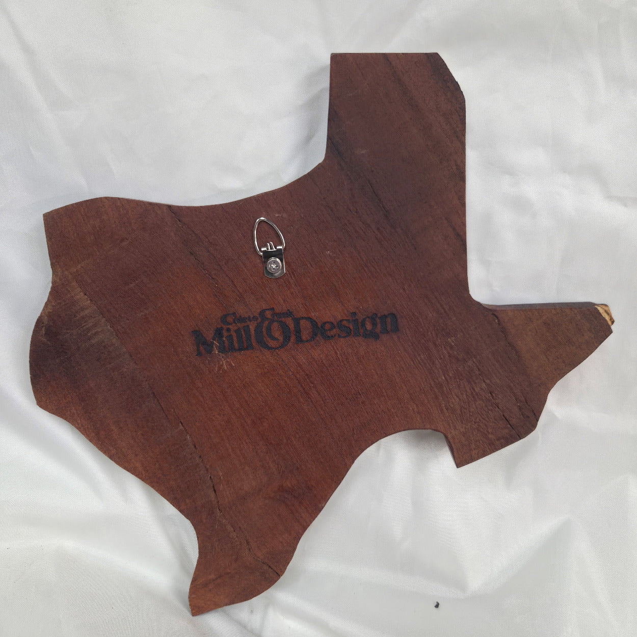 back view A carved mesquite wall plaque shaped like the state of Texas, with Blue epoxy fill and semi-gloss finish