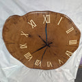 Large live edge Live Oak clock with wooden roman numerals with blue epoxy inlay and black clock arms