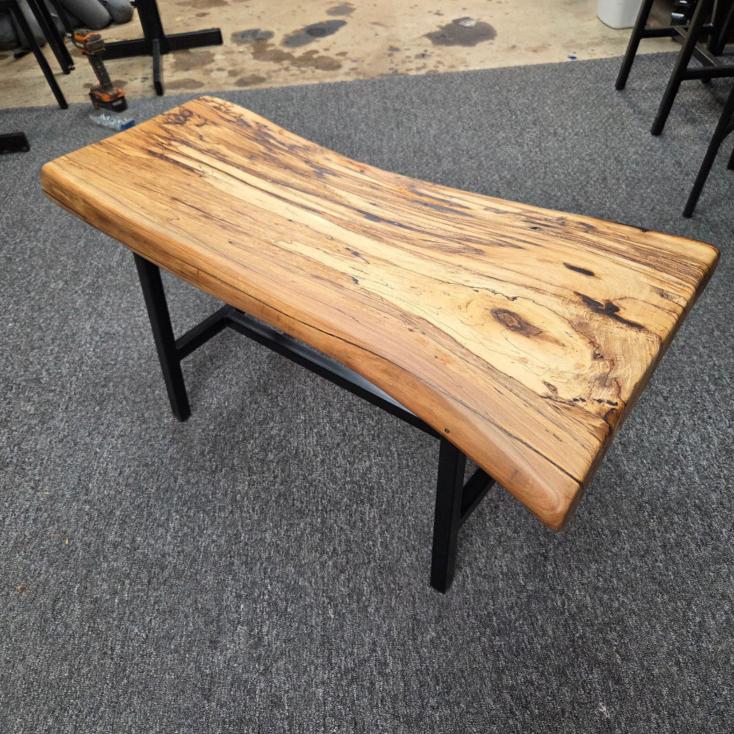 Elm Coffee table with live edges on black metal tube legs system