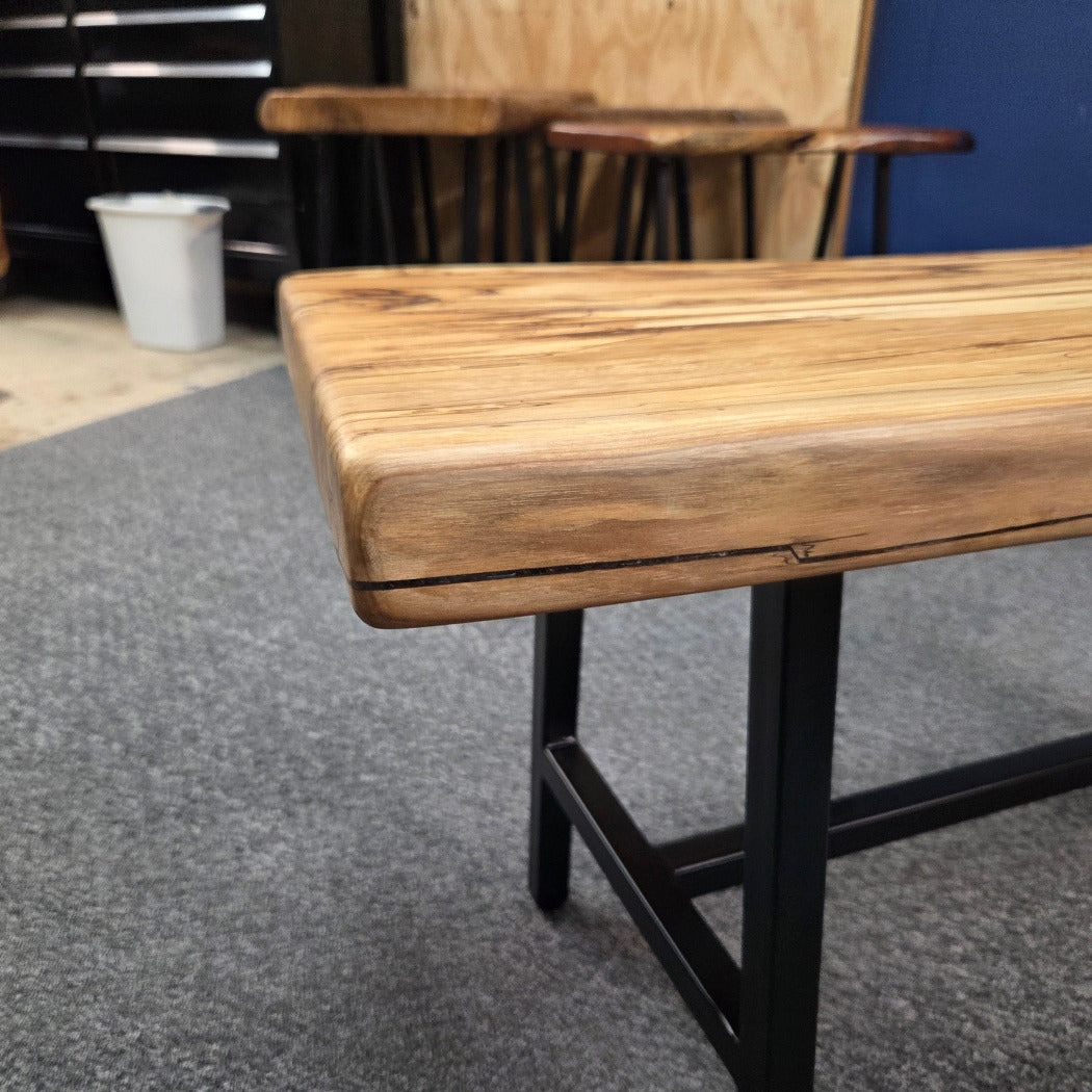 Elm Coffee table with live edges on black metal tube legs system