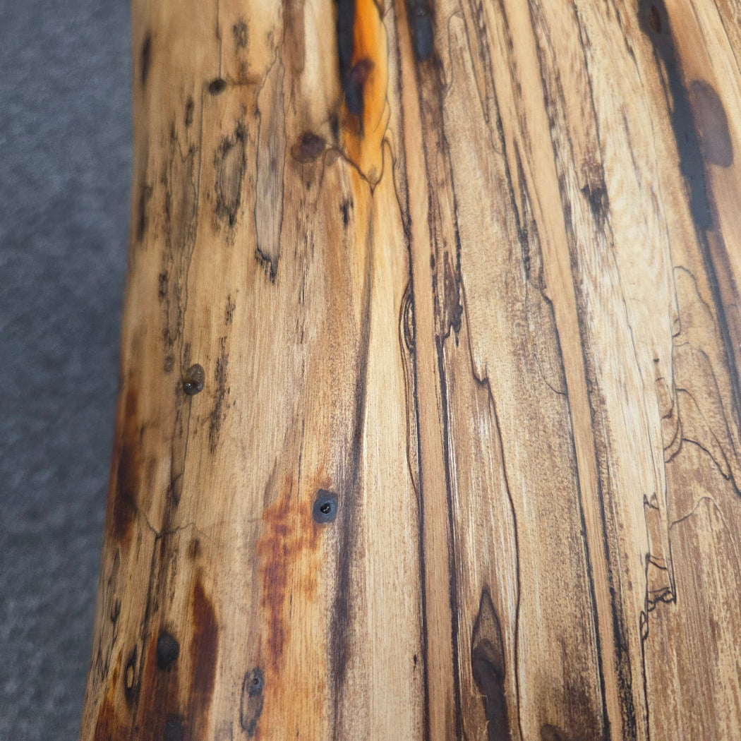 Elm Coffee table with live edges on black metal tube legs system