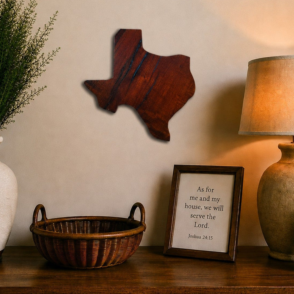 Handcrafted Mesquite Texas Wall Art displayed above a rustic farmhouse console with decorative vase, basket, and table lamp.