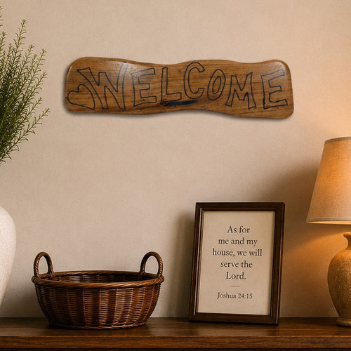 "Handcrafted wooden Welcome wall sign with blue epoxy fill displayed above a rustic console table in a warm farmhouse entryway."