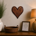 Handcrafted Mesquite Heart Wall Art displayed above a rustic farmhouse console with decorative vase, basket, and table lamp.