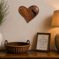 Handcrafted Mesquite Heart Wall Art displayed above a rustic farmhouse console with decorative vase, basket, and table lamp.