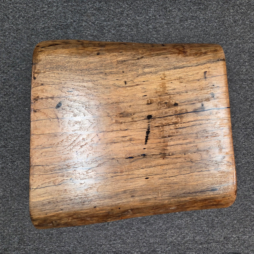 Handcrafted pecan coffee table with natural wood character and black metal legs 