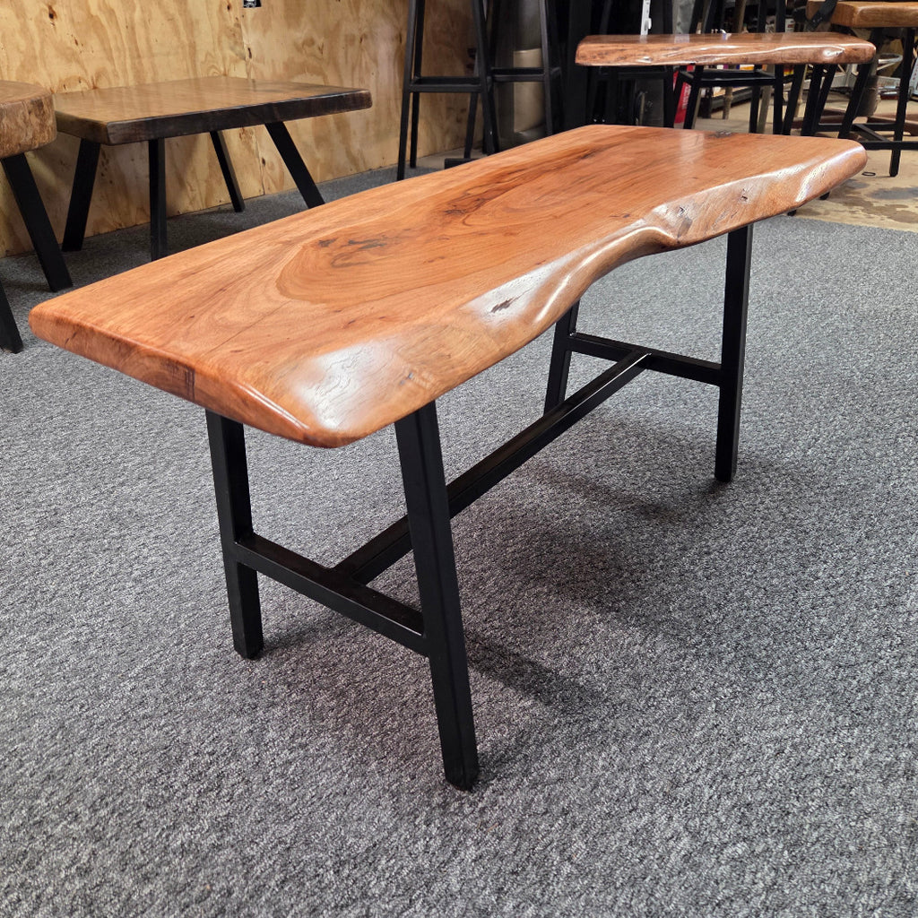 Handcrafted live edge pecan coffee table with Honey Oak stain and black steel legs