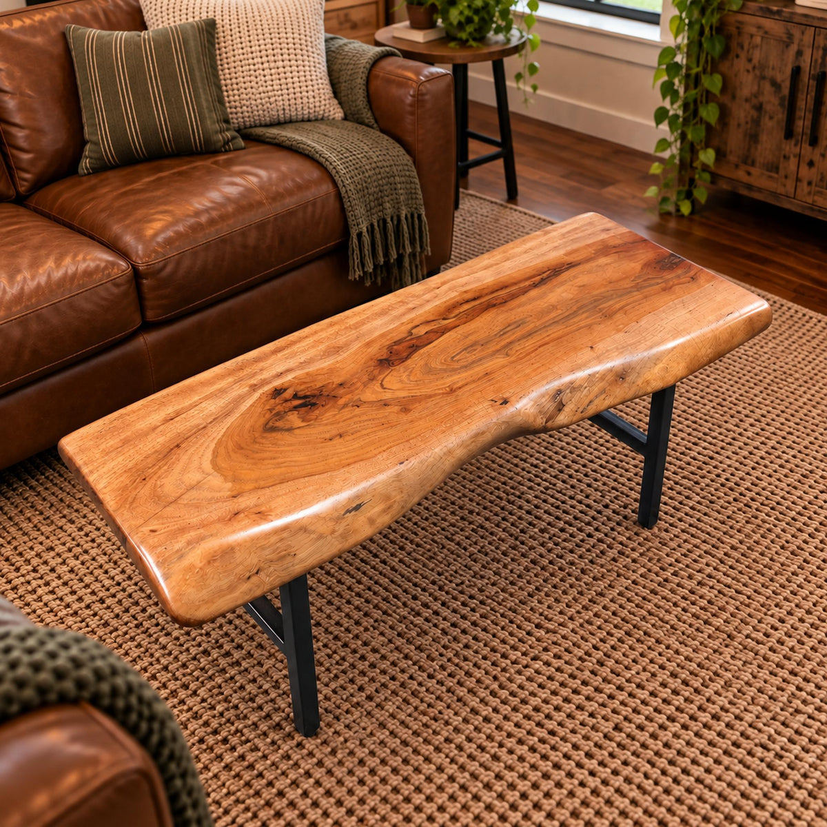 Handcrafted live edge pecan coffee table with Honey Oak stain and black steel legs