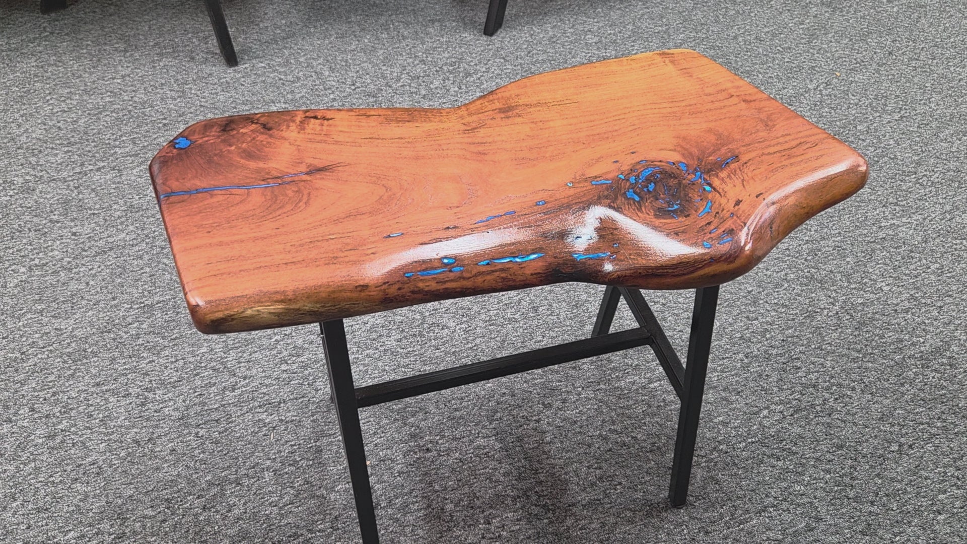 Live Edge mesquite end table with blue epoxy inlay on black metal square tubed legs