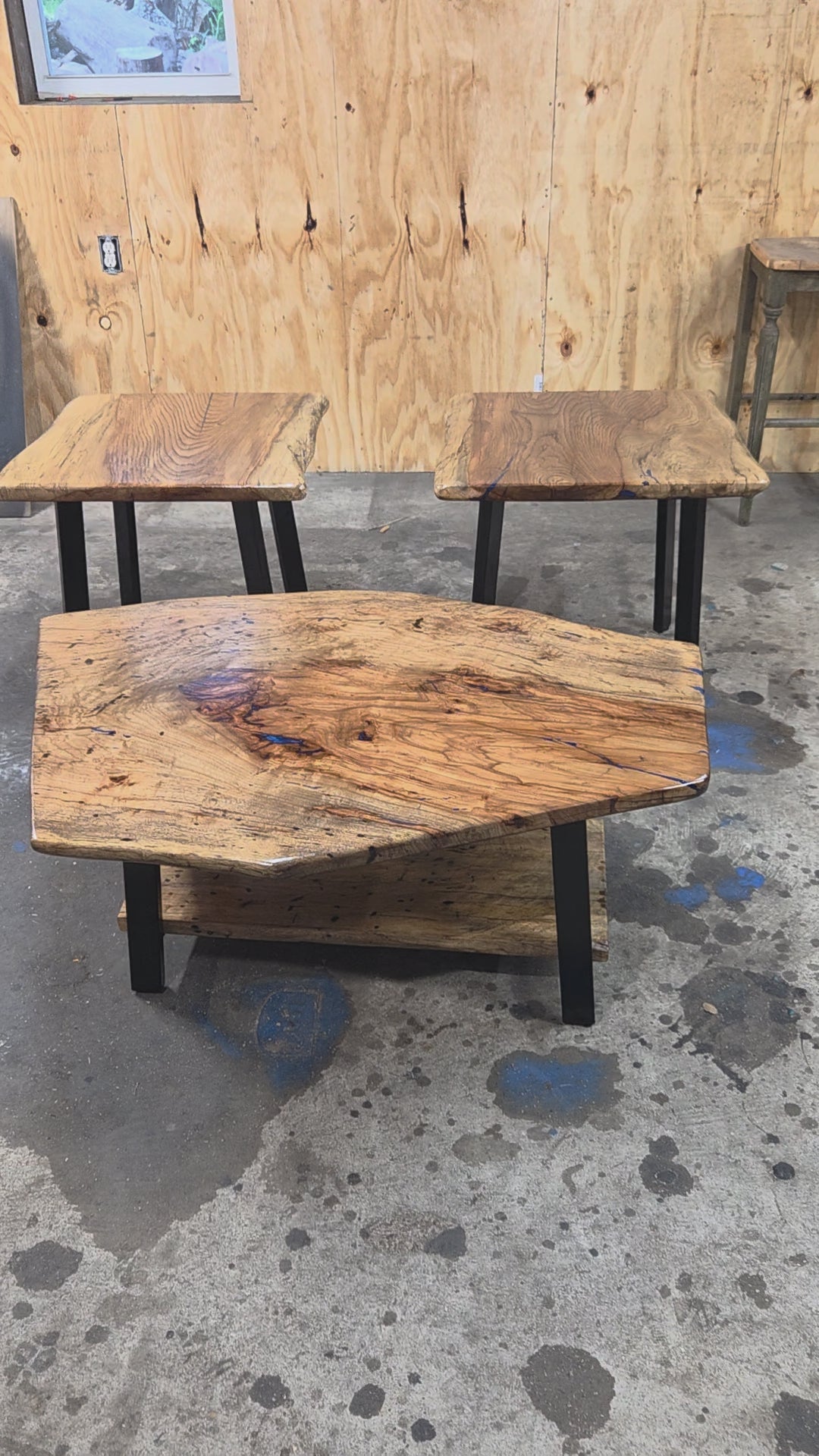Live edge rustic Rectangular Pecan coffee table with lower shelf on black metal legs, blue epoxy inlay