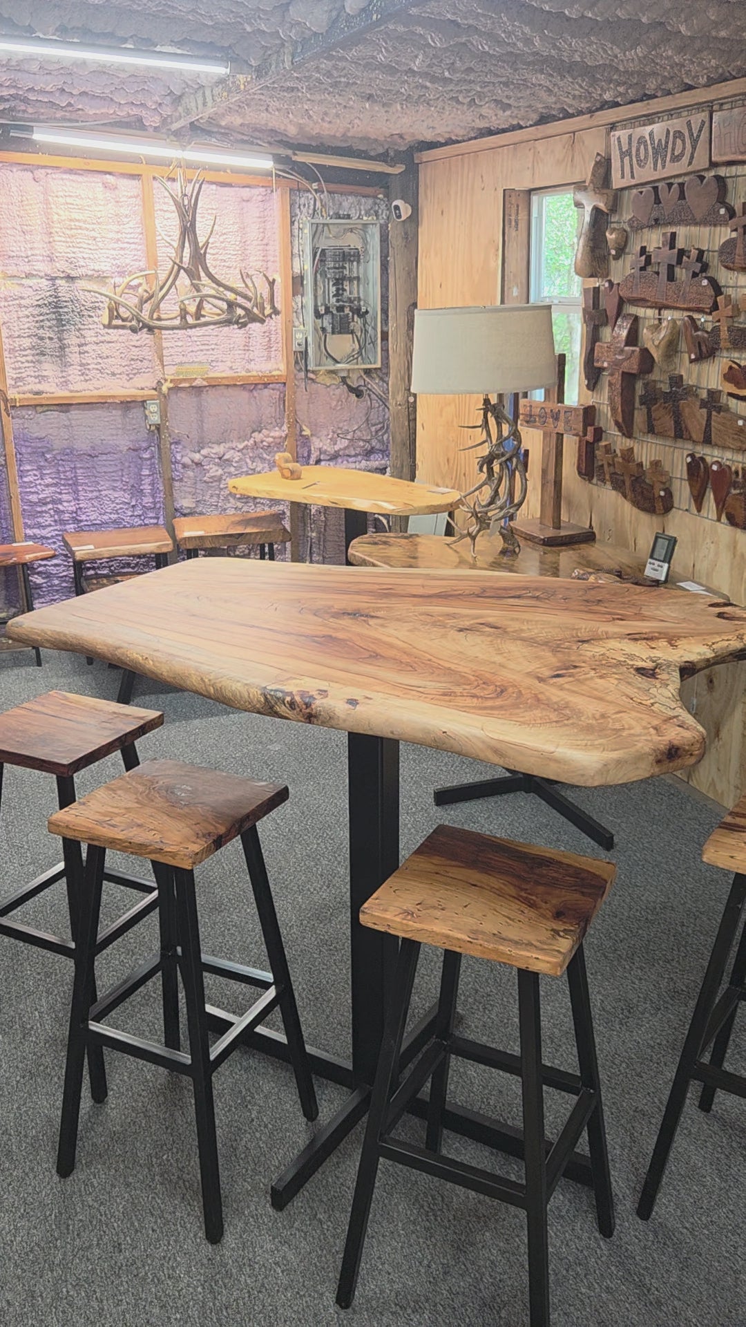 Live edge Burl Pecan Breakfast table with black metal pedestal legs and four matching pecan bar stools